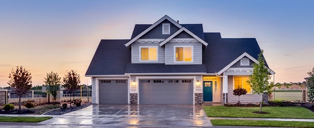 Exterior of a modern two-story home at dusk